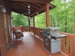Back deck off the living room with BBQ Gas Grill and Chairs